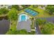 Aerial view of community pool, tennis courts, and well-manicured green space at 404 Snowy Egret Dr., Murrells Inlet, SC 29576