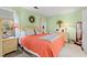 Inviting bedroom featuring light green walls, a decorative wreath, and coordinated furniture at 404 Snowy Egret Dr., Murrells Inlet, SC 29576