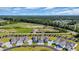 An elevated view of a neighborhood featuring well-spaced homes, manicured lawns, and serene surroundings at 4053 Taranto Loop # C, Myrtle Beach, SC 29579