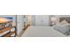 Comfortable bedroom has a television, closet, and access to the bathroom at 4053 Taranto Loop # C, Myrtle Beach, SC 29579