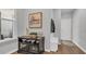 Inviting entryway featuring a console table with decor and a convenient coat rack with storage bench at 4053 Taranto Loop # C, Myrtle Beach, SC 29579