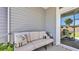Covered patio with comfortable seating area, perfect for enjoying the outdoors in comfort at 4053 Taranto Loop # C, Myrtle Beach, SC 29579
