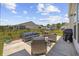 Spacious backyard with outdoor seating, a grill, and well-maintained landscaping, perfect for entertaining at 4449 Honir Dr., Myrtle Beach, SC 29579