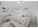 Bright bedroom with a ceiling fan, coastal-themed decor, and comfortable furnishings at 4449 Honir Dr., Myrtle Beach, SC 29579
