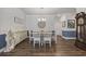 Elegant dining room with wood floors, a chandelier, and stylish decor, perfect for gatherings at 4449 Honir Dr., Myrtle Beach, SC 29579