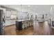Spacious kitchen with a large island and seating, flowing into the living room for easy entertaining at 4449 Honir Dr., Myrtle Beach, SC 29579