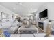 Spacious open floor plan with hardwood floors, fireplace, leading to a gourmet kitchen with island seating at 4449 Honir Dr., Myrtle Beach, SC 29579