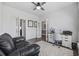 Spacious home office with a seating area and desk, offering a comfortable workspace at 4449 Honir Dr., Myrtle Beach, SC 29579