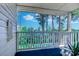 Scenic balcony offering peaceful nature views and cozy seating area at 4486 Little River Inn Ln. # 2107, Little River, SC 29566