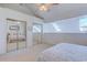 Bright loft bedroom showing mirrored closet doors and open access to additional rooms at 4486 Little River Inn Ln. # 2107, Little River, SC 29566