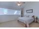 Bright bedroom featuring dormer windows, built-in shelving and ceiling fan at 4486 Little River Inn Ln. # 2107, Little River, SC 29566