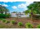 Welcoming community sign amidst lush tropical plants and blue skies at 4486 Little River Inn Ln. # 2107, Little River, SC 29566
