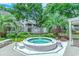 Inviting community hot tub surrounded by lush landscaping and seating areas at 4486 Little River Inn Ln. # 2107, Little River, SC 29566