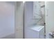 A stacked washer and dryer with white finishes offer in-unit laundry convenience at 4486 Little River Inn Ln. # 2107, Little River, SC 29566