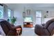 Bright living room with comfortable seating and natural light from large windows at 4486 Little River Inn Ln. # 2107, Little River, SC 29566