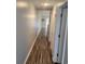 Hallway with hardwood flooring at 477 White River Dr. # 32-H, Myrtle Beach, SC 29579