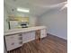 Bright kitchen with wooden cabinets, laminate floors, and breakfast bar seating at 477 White River Dr. # 32-H, Myrtle Beach, SC 29579