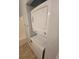 Conveniently stacked washer and dryer in the bathroom with easy access at 477 White River Dr. # 32-H, Myrtle Beach, SC 29579