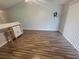 Bright living room featuring hardwood flooring and sliding glass door at 477 White River Dr. # 32-H, Myrtle Beach, SC 29579
