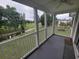 Balcony view overlooking the golf course and creek, providing a serene outdoor space at 477 White River Dr. # 32-H, Myrtle Beach, SC 29579