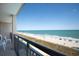 Balcony view features ocean, beach and lounge chairs at 4800 S Ocean Blvd. # 504, North Myrtle Beach, SC 29582