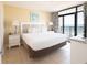 Bright, airy bedroom has balcony access and ocean views at 4800 S Ocean Blvd. # 504, North Myrtle Beach, SC 29582