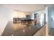Well-lit kitchen with stainless steel appliances and bar seating at 4800 S Ocean Blvd. # 504, North Myrtle Beach, SC 29582