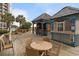 Inviting outdoor bar area with seating, wooden deck, and poolside views at 4800 S Ocean Blvd. # 504, North Myrtle Beach, SC 29582