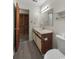 Bathroom with laminate flooring, vanity, mirror, and a toilet at 500 Fairway Village Dr. # 3-L, Myrtle Beach, SC 29588