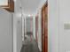 Hallway leading into the main living area, featuring a carpet and doors at 500 Fairway Village Dr. # 3-L, Myrtle Beach, SC 29588