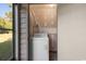 Laundry room with white dryer at 500 Fairway Village Dr. # 3-L, Myrtle Beach, SC 29588