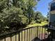 Balcony view overlooking trees and green space at 5001 Little River Rd. # W-211, Myrtle Beach, SC 29577