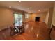 Living room with recessed lighting, a dining table, a TV on a stand, and a glass sliding door to a balcony at 5001 Little River Rd. # W-211, Myrtle Beach, SC 29577