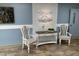 Well-decorated lobby featuring elegant chairs, console table and modern artwork at 5001 Little River Rd. # W-211, Myrtle Beach, SC 29577