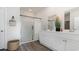 Modern bathroom with double vanity, white cabinets, a glass enclosed shower, and stylish decor at 5141 Yellowstone Dr., Conway, SC 29526