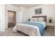 Inviting bedroom with a woven headboard, decorative pillows, and bright bedside lamps for a relaxing ambiance at 5141 Yellowstone Dr., Conway, SC 29526