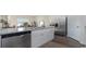 Kitchen island featuring granite countertops, stainless steel appliances and white cabinets at 5141 Yellowstone Dr., Conway, SC 29526