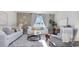 Comfortable living room with stylish furnishings, a decorative accent wall, and a bright, airy atmosphere at 5141 Yellowstone Dr., Conway, SC 29526