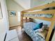 Charming bedroom with a bunk bed, vaulted ceiling, and serene decor at 6001-1168 S Kings Hwy., Myrtle Beach, SC 29575