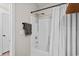 Bright bathroom with a bathtub and shower with white shower curtain at 6015 Catalina Dr. # 534, North Myrtle Beach, SC 29582