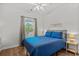 Cozy bedroom with a large window, soft lighting, and comfortable furnishings at 6015 Catalina Dr. # 534, North Myrtle Beach, SC 29582
