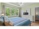Light and airy bedroom featuring a spacious window with natural light and white dresser at 6015 Catalina Dr. # 534, North Myrtle Beach, SC 29582