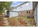 Backyard featuring a brick foundation, patio, and storage shed offering outdoor space and storage solutions at 6501 Somerset Dr., Myrtle Beach, SC 29572