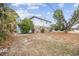 Exterior view of the backyard, showcasing its spaciousness and surrounding greenery at 6501 Somerset Dr., Myrtle Beach, SC 29572