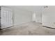 Bedroom with a carpeted floor and a door leading outside at 6501 Somerset Dr., Myrtle Beach, SC 29572