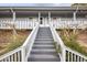 View of the staircase leading to the units in this two-story apartment complex at 6501 Somerset Dr., Myrtle Beach, SC 29572
