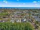 Scenic aerial view of the community with trees, roadways, and a marker designating the location of the unit at 6703 Jefferson Pl. # B7, Myrtle Beach, SC 29572