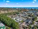 An aerial view shows the community with trees, roadways, and the unit designated with a marker at 6703 Jefferson Pl. # B7, Myrtle Beach, SC 29572