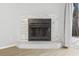 Fireplace with tile surround and flooring with sliding glass doors for access to outdoors at 6703 Jefferson Pl. # B7, Myrtle Beach, SC 29572