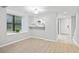 Open concept living space with breakfast bar and lots of natural light at 6703 Jefferson Pl. # B7, Myrtle Beach, SC 29572